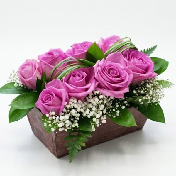 Blush Rose Box Blush Rose Box with pink roses, baby's breath and green leaves in a low wooden box