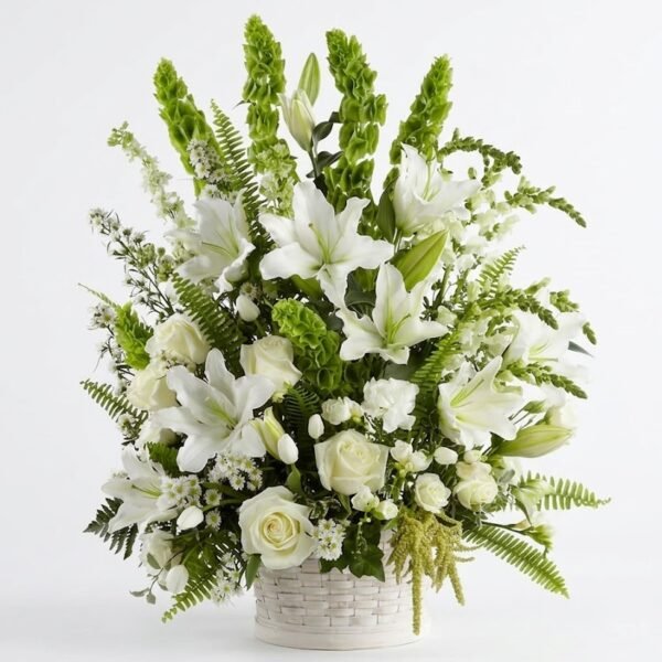 Lily White Basket Lily White Basket with white lilies, white roses, green bells of Ireland and ferns in a white basket