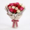 Love in Bloom bouquet of red, pink, white and bicolour roses in cream and grey wrap tied with a dusty pink satin bow