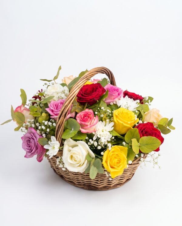 Mini Mix Bloom Basket: red, pink, lilac, yellow and white roses with white chrysanthemums and baby's breath in a wicker basket with a handle