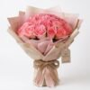 Pink Rose Bouquet Pink Rose Bouquet: pink roses wrapped in pink and cream paper with a burlap bow and gift tag