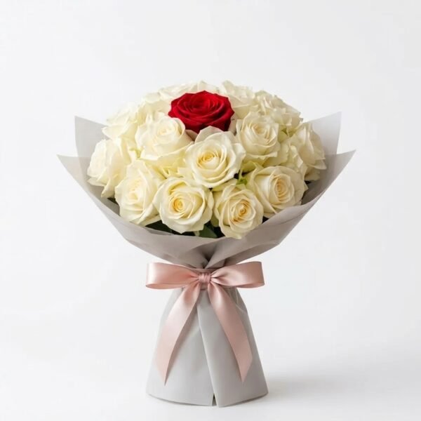 Pure Elegance Bouquet Pure Elegance Bouquet: white roses with a single red rose in light grey wrap with a blush satin bow