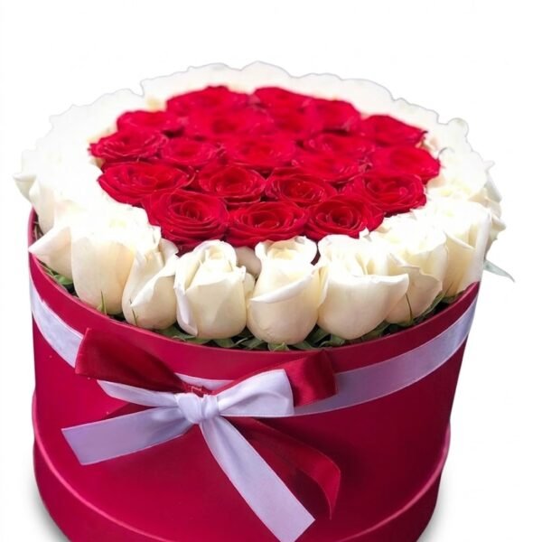 Royal Glow Box: red roses ringed by white roses in a red round box with a white ribbon