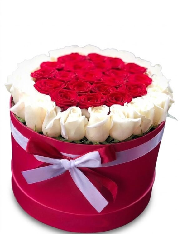 Royal Glow Box: red roses ringed by white roses in a red round box with a white ribbon