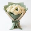 White Roses Bouquet White Roses Bouquet: white roses wrapped in sage green and cream paper with a green ribbon