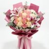 Lilies with Pink and White Roses Flower Arrangement Lilies with Pink and White Roses Flower Arrangement: pink and cream roses, two lilies, eucalyptus, pink wrapping