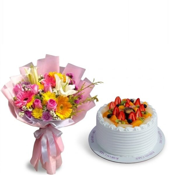 Mixed Flowers & Fruit Cake Mixed Flowers & Fruit Cake: gerberas, pink roses, white lilies and chrysanthemums in pink wrapping beside a white cream cake topped with strawberries, kiwi and blueberries
